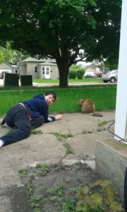 Arianna and neighbor cat